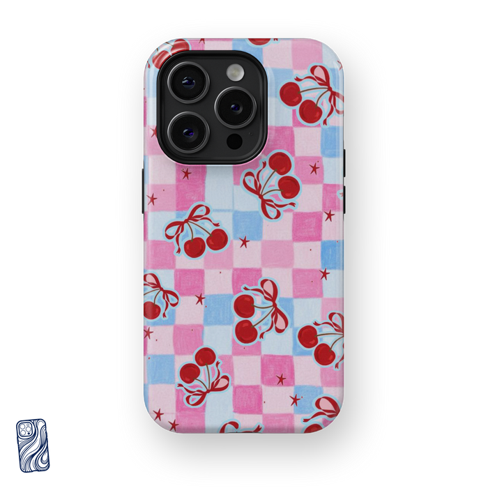 Cherry Pop Baby Blue premium iPhone case featuring red cherries and bows on a pink and blue checkerboard pattern from the CoverShell Dolce Vita Collection.
