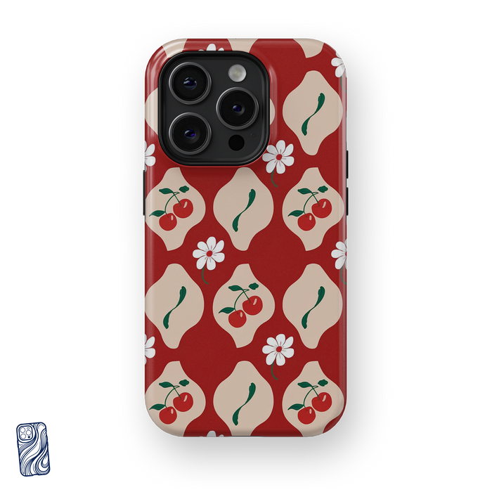 Amore Cherry Rosso premium iPhone case with cherry illustrations, cream geometric motifs and white flowers on a rich red background from CoverShell.