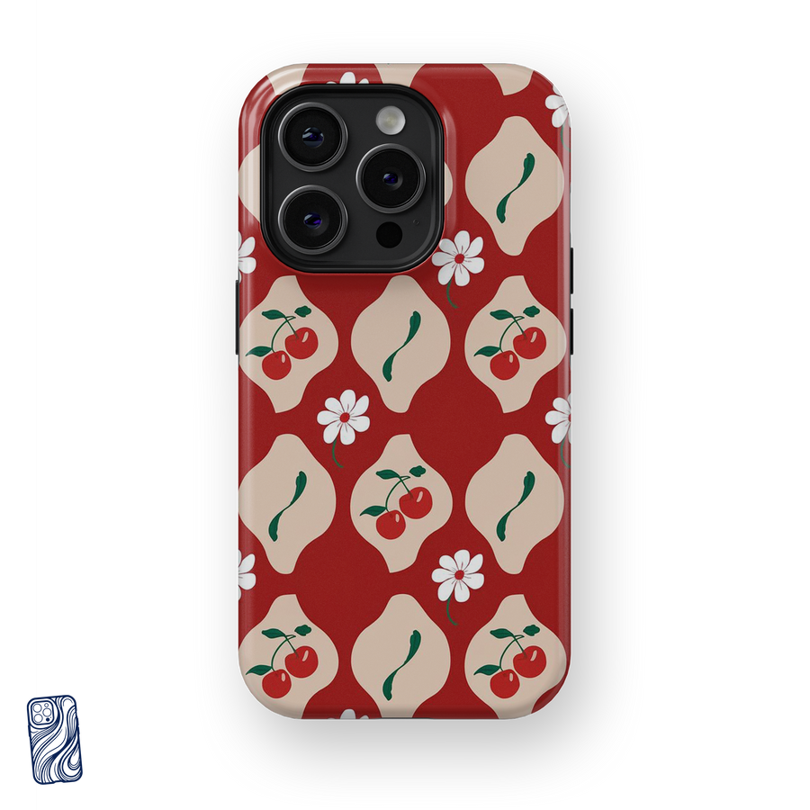 Amore Cherry Rosso premium iPhone case with cherry illustrations, cream geometric motifs and white flowers on a rich red background from CoverShell.